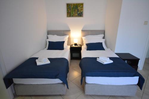 Posteľ alebo postele v izbe v ubytovaní Apartman Viktoria