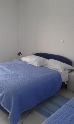 Säng eller sängar i ett rum på Apartment Villa Bajna