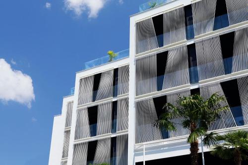 an exterior view of a building with windows at Lifestyle Hotel Vitar - Adults Only in Bol