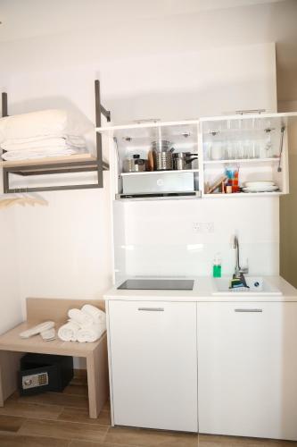 Kuchyň nebo kuchyňský kout v ubytování Coral Boutique Apartments