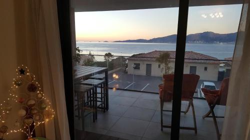 Photo de la galerie de l'établissement Appt vue mer Baie Ajaccio PietroBeach à 25m d'une crique magnifique, à Pietrosella