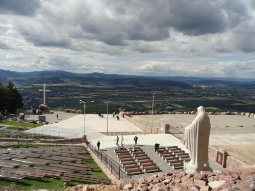 a statue sitting on top of a amphitheater at Privát Čerenica in Beluša