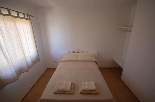 Ένα ή περισσότερα κρεβάτια σε δωμάτιο στο Villa Maris Ecolodge