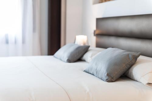 Postel nebo postele na pokoji v ubytování Can Vent Boutique Hotel