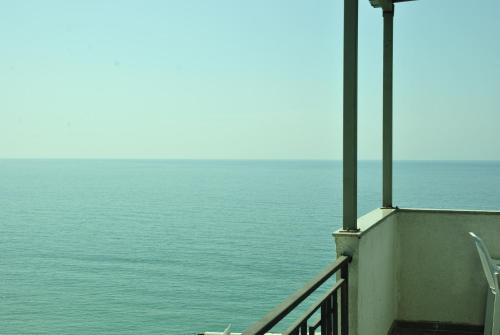 a view of the ocean from a balcony at the View Apartment in Makhinjauri