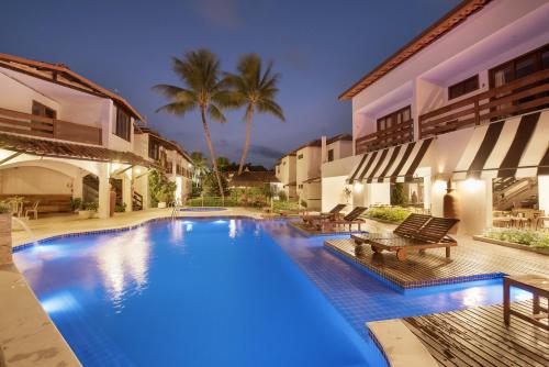 Bazén v ubytování Pousada Quatro Estações nebo v jeho okolí