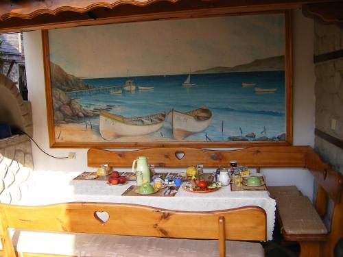 Ένα ή περισσότερα κρεβάτια σε δωμάτιο στο Dari Guest Rooms Стаи за гости Дари