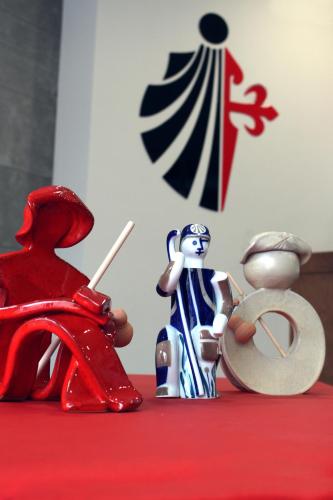 a group of toy figurines sitting on a table at HOTEL ARZÚA in Arzúa