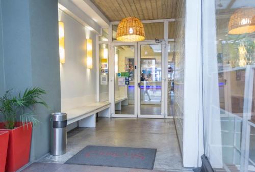 an entrance to a store with a glass door at Circus Hostel in Buenos Aires