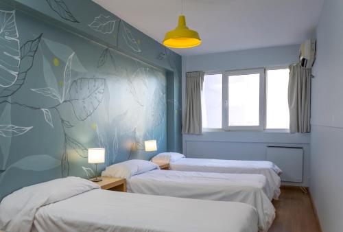 Postel nebo postele na pokoji v ubytování Circus Hostel