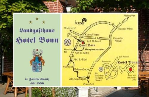 a yellow sign with a map of a street at Landgasthaus Bonn in Baunatal