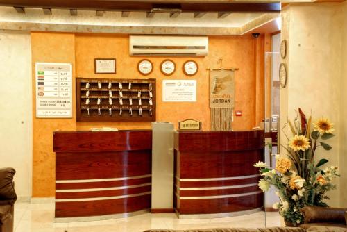 a wine shop with a display of wine bottles at Jardaneh Hotel in Aqaba