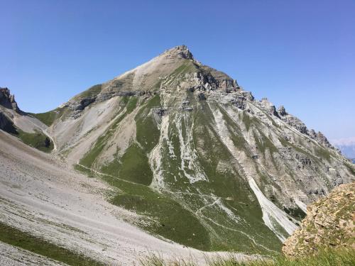 a mountain in the middle of a field at Maria Waldrast in Matrei am Brenner
