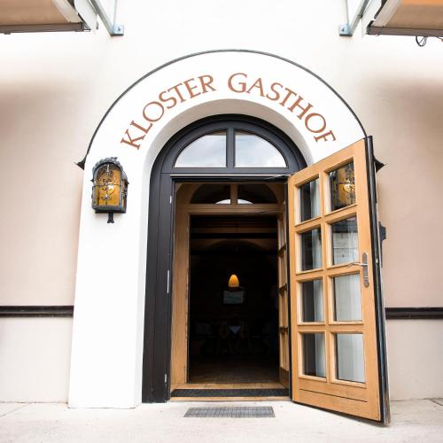 a door to a flower eatery with a sign over it at Maria Waldrast in Matrei am Brenner