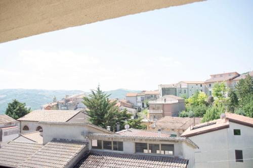a view of a city from the roof of a building at BnB acasaconme in Lucito