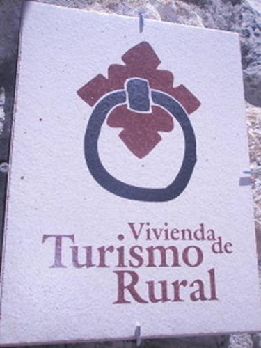 a sign for at Jardín de Hoz in Hoz de Jaca