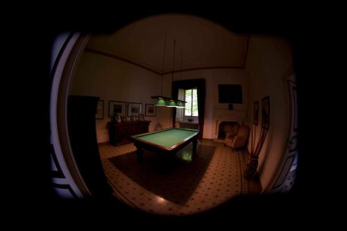 a view of a room with a pool table at Castello di Serragiumenta in Firmo