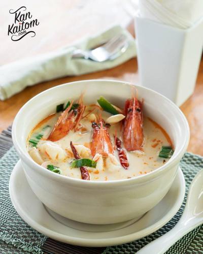 a bowl of soup on a plate on a table at Shantaa Resort, Kohkood in Ko Kood