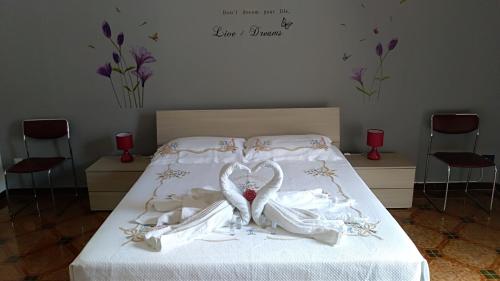 Postel nebo postele na pokoji v ubytování B&B Al centro di Lecce