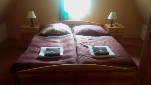 מיטה או מיטות בחדר ב-Chata Dolce I