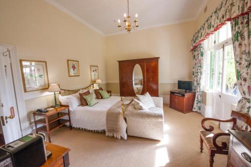 Letto o letti in una camera di Hacklewood Hill Country House
