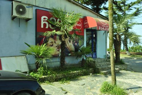 a building with an advertisement on the side of it at the View Apartment in Makhinjauri