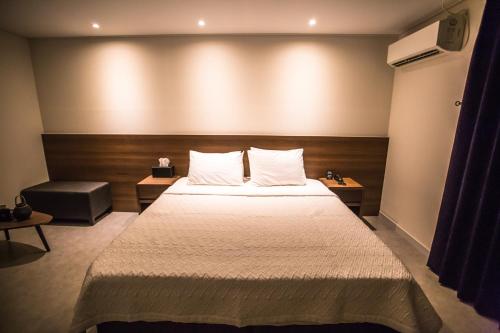 Ένα ή περισσότερα κρεβάτια σε δωμάτιο στο Hotel Egg