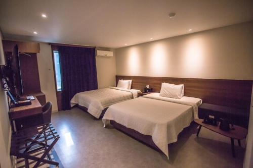 Ένα ή περισσότερα κρεβάτια σε δωμάτιο στο Hotel Egg