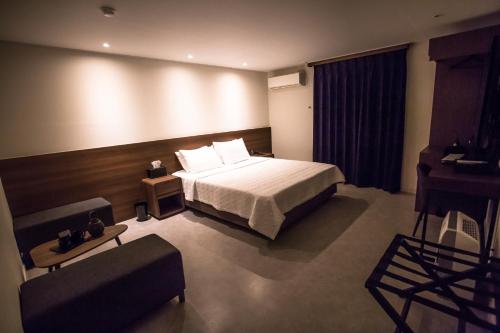 Ένα ή περισσότερα κρεβάτια σε δωμάτιο στο Hotel Egg