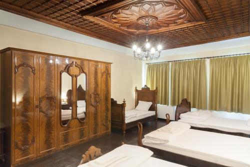 Ένα ή περισσότερα κρεβάτια σε δωμάτιο στο HiStory INN Unique Guest House