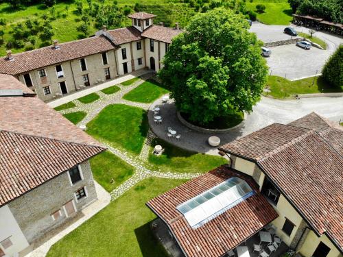 an aerial view of a building with a tree at Relais Montemarino in Borgomale