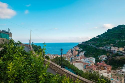 a view of the city of positano and the ocean at Villa Carlotta Minori in Minori