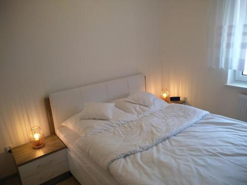 Posteľ alebo postele v izbe v ubytovaní Apartament Limonkowy Kołobrzeg Podczele