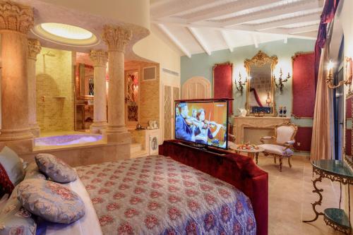 Lukka Exclusive Hotel – Adult Only +12にあるテレビまたはエンターテインメントセンター