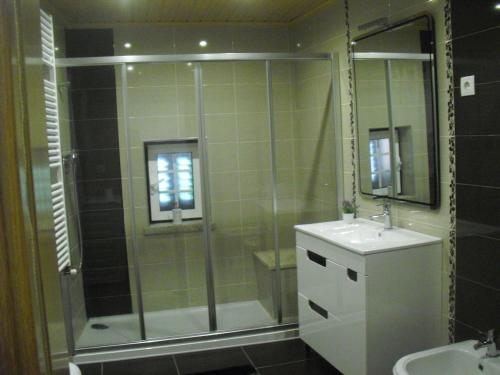 Ванная комната в Alojamento Pelourinho