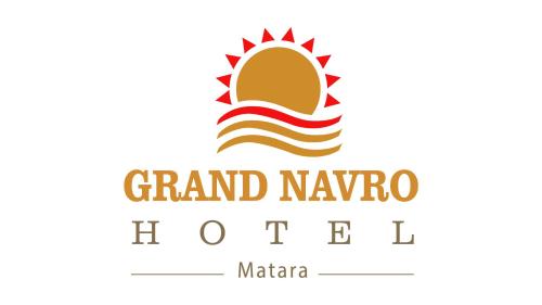 Grand Navro Hotelに飾ってある許可証、賞状、看板またはその他の書類