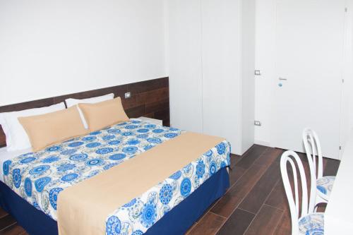 Ένα ή περισσότερα κρεβάτια σε δωμάτιο στο Casa Restino