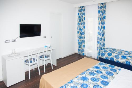 Ένα ή περισσότερα κρεβάτια σε δωμάτιο στο Casa Restino