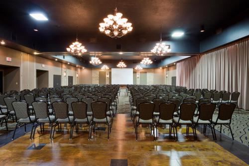 a large room with a bunch of chairs in it at Carrollton Hotel in Carroll