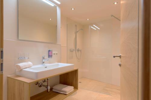Ванная комната в Quality Hosts Arlberg - Haus Pepi Eiter