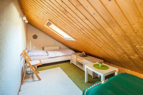 Säng eller sängar i ett rum på Moosberg Haus Mizzi