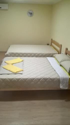Postel nebo postele na pokoji v ubytování Djurdja 2 Apartman