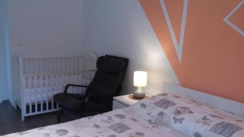 Vuode tai vuoteita majoituspaikassa Apartma Juha -