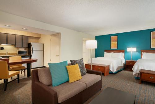Ένα ή περισσότερα κρεβάτια σε δωμάτιο στο Hawthorn Suites by Wyndham Tinton Falls