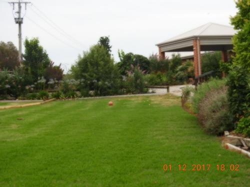 Κήπος έξω από το Barklysuites Apartments