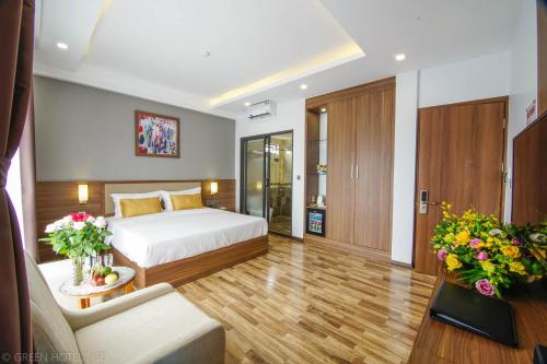 Postel nebo postele na pokoji v ubytování Green Hadong Hotel