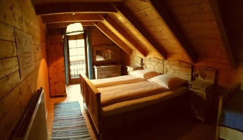 a bedroom with two beds in an attic at Ferienhaus Gobald in Murau