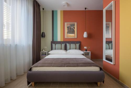 Ένα ή περισσότερα κρεβάτια σε δωμάτιο στο I Registi