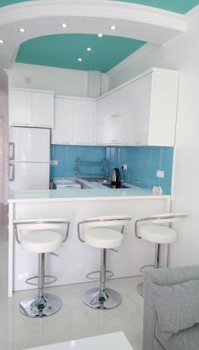 ครัวหรือมุมครัวของ Batumi-Studio 482
