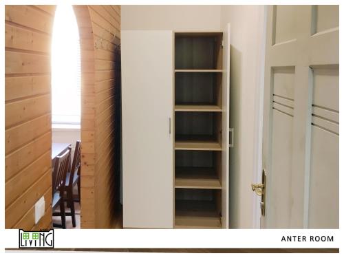 a room with an open door and a stairway at ACO Living - A Cheap Overnight in Klagenfurt